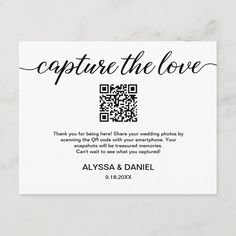 a white card with black ink that says capture the love on it and an image of a qr code