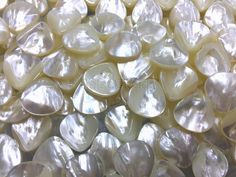 MOP briolette teardrop beads - luster white mother of pearl drop beads - natural sea shell beads ✧Material: mother of pearl, MOP sea shell ✧Nautral: natural sea shell ✧Color: white ✧Shape: briolette teardrop ✧Size: 13mm 16mm 18mm 20mm 25mm ✧Quality: grade A, good luster ✧Sold unit: pls choose from dropdown menu See more shell beads here: https://www.etsy.com/shop/SelectBeads?ref=listing-shop2-all-items-count&search_query=shell+beads See more white beads here: https://www.etsy.com/shop/Select White Mother Of Pearl Shell For Wedding, Shell Color, Sparkle Wedding, Beads Wholesale, Teardrop Beads, Square Bead, Beaded Top, Drop Beads, Beaded Material