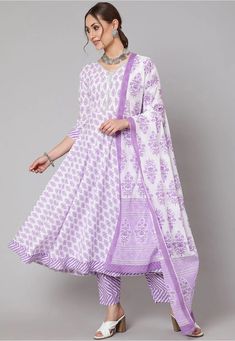 Pure Cotton Anarkali Kameez in White This Readymade attire is Enhanced with Floral Print and Gota Lace Work. Crafted in V Neck and Quarter Sleeve Available with a Pure Cotton Pant in Light Purple and White and a Poly Cotton Dupatta in White The Kameez and Bottom Lengths are 46 and 38 inches respectively Do note: Accessories shown in the image are for presentation purposes only and length may vary upto 2 inches.(Slight variation in actual color vs. image is possible). Cotton Fitted Anarkali Set With Sheer Dupatta, Fitted Cotton Anarkali Set With Sheer Dupatta, Cotton Floor-length Salwar Kameez For Diwali, Floor-length Cotton Salwar Kameez For Diwali, Cotton Floor-length Salwar Kameez, Anarkali Churidar With Block Print For Eid, Eid Anarkali Churidar With Block Print, White Block Print Anarkali Set For Eid, White Block Print Churidar For Eid