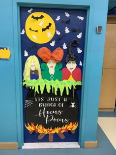 a door decorated with witches and bats