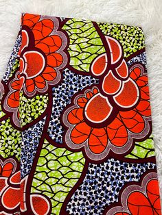 This orange African Fabric is high quality African print made from 100% cotton and it's 45 inches wide. It is used for making African Clothing, African quilts, & For Home decoration. FYI: Print is Double sided. The listing is for 1, 6 yards and Headwrap Each piece of fabric measures:  36in by 45in for 1 yard 216in by 45in for 6 yards 70in by 22in for Head wrap If you purchase more than one yard, you will receive one continuous piece. *If you require more than what I have listed, feel free to sen Blue Printed Ankara Fabric, Blue Ankara Print Fabrics, Orange Ankara Fabric With Batik Print, Ankara Fabric With Vibrant Print, Colorful Patterned Red Ankara Fabric, Printed Orange Ankara Fabric, Clean And Press, African Quilts, Tiger Stripes