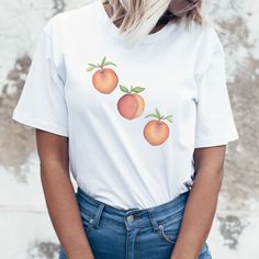 Are you looking for a peach t-shirt for friends and family? Then this cute peach tshirt good be a nice birthday or mother's day gift. Surprise a nature lover with this cottagecore inspired spring shirt. T-shirt:     * This is an unisex t-shirt. Perfect fit for men and women. For women who like their t-shirt more tight than choose one size smaller. You can also choose your normal size for a little extra room to tie the t-shirt.     * Measure one of your own shirts when it is laying flat. Measure Trendy Peach Relaxed Fit T-shirt, Trendy Relaxed Fit Peach T-shirt, Trendy Heather Peach T-shirt For Summer, Heather Peach Relaxed Fit T-shirt For Summer, Cute Peach Crew Neck T-shirt, Trendy Heather Peach T-shirt For Spring, Peach Graphic Tee Short Sleeve, Peach Graphic Tee With Short Sleeves, Peach Short Sleeve Graphic Tee