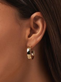 Our medium gold hoop earrings are the needed solid gold addition to your collection. Made with 100% waterproof & recycled solid gold, perfect for everyday wear. Gold Huggie Hoop Earrings, Twist Ring, Huggie Hoop Earrings, Letter Necklace, Online Jewelry Store, Gold Hoop, Gold Hoop Earrings, Jewelry Stores, Gold Earrings