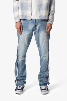 the B574 Zipper Denim are designed with our new B fit, which is relaxed through the thigh and features a slight flare at the leg opening and is constructed from medium washed blue denim, panelling at the inseam and outseam from contrasting denim for a slight flare, and finished with a exposed zipper details at the outseam. details flare at leg opening 100% cotton model is 6’1, 140 lbs and wears a size 30 Urban Style Medium Wash Rigid Denim Flare Jeans, Urban Flare Jeans In Medium Wash Rigid Denim, Streetwear Medium Wash Flare Denim Jeans, Medium Wash Denim Flare Jeans For Streetwear, Light Wash Zip Fly Jeans For Streetwear, Medium Wash Straight Leg Bottoms With Zipper Closure, Blue Bottoms With Zipper Closure For Streetwear, Blue Jeans With Zipper Closure For Streetwear, Urban Straight Leg Jeans With Zipper Closure