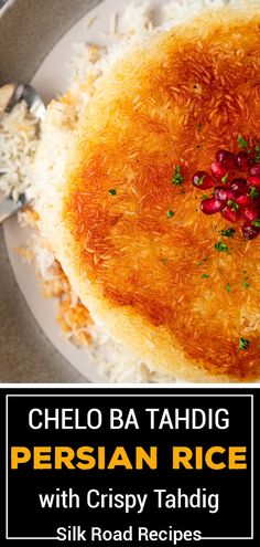 a close up of a plate of food with rice and pomegranates