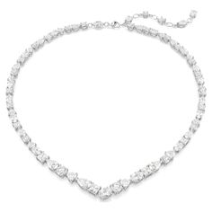 Exquisite refinement is brought to life in this show-stopping jewelry set from the Mesmera family. The necklace is made with a string of eye-catching Swarovski Zirconia on a rhodium plating setting, all produced in a surprising mix of cuts and sizes. For extra luxury, the elongation is completed with a lobster closure and a scattering of Swarovski Zirconia. The light-catching earrings are also rhodium plated, with a bold hanging design featuring luminous pear-cut crystals. Gift this set to a lov Elegant Jewelry Silver, Crystal Necklace Designs, Hogwarts Style, Formal Necklace, Charms Pandora, Pretty Necklace, Luxury Necklace, Swarovski Necklace, Holiday Earring