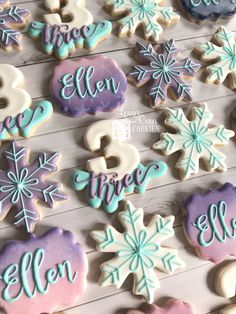 decorated cookies with snowflakes and names on them