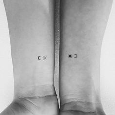 two people with matching tattoos on their feet