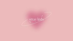 the word stray kids written in white on a pink background with a heart shaped outline