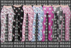 hello kitty pajama pants are lined up in different colors