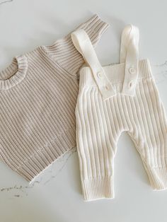 Knit overalls with adjustable straps and front button closure. Match this timeless piece with our chunky sweaters to create a cozy and irresistible outfit. Knit Overalls, Chunky Sweaters, Ribbed Knit Sweater, Baby Socks, Chunky Sweater, Textured Knit, Ribbed Sweater, Holiday Collection, Socks For Sale