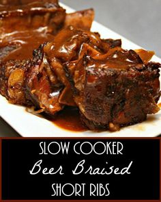 slow cooker beer braised short ribs on a white plate with brown gravy