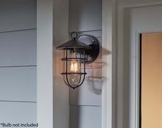 This fixture from the Halyard collection offers a combination of nautical styling with a nod toward industrial design. Clear glass and metal cage with hood finishes off the look perfectly. Project Source Halyard 1-Light 10-in H Black Outdoor Wall Light | WL136MBK Outdoor Farmhouse Lighting Overstock, Farmhouse Porch Lights The Home Depot, Modern Farmhouse Outdoor Lighting Lowe's, Farmhouse Outdoor Lights By Build.com, Nautical Farmhouse, Farmhouse Exterior Lantern Lighting Motion Sensor, Black Outdoor Wall Lights, Filament Bulb, Outdoor Porch