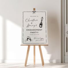 an easel with a sign that says welcome to marriage and engagement party on it