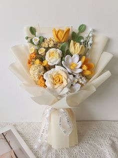 a bouquet of flowers sitting on top of a table