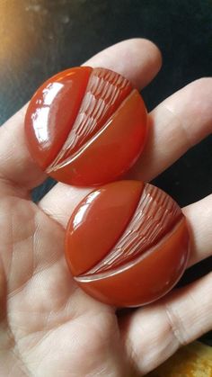 These earrings are really impressive. They are 1 1/4 inches across and beautifully carved. The bakelite is so shiny and really reflects light. The screwbacks are sterling. Just a really good pair of earrings. Follow me on instagram@jettesjewels. Mid-century Handmade Earrings As Gift, Handmade Mid-century Earrings As Gift, Handmade Mid-century Style Earrings For Gifts, Screw Back Earrings, Vintage Buttons, Painted Rocks, Etsy Earrings, Follow Me, Gemstone Rings