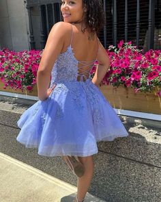 This stunning homecoming dress features a beautiful lace design and sparkling glitter accents. The flattering spaghetti straps and sleeveless cut add a touch of elegance to this gorgeous dress. Perfect for any special occasion, this dress is sure to make you stand out and feel confident. White Iridescent Prom Dress, Iridescent Prom Dress, Blue Lace Prom Dress, Custom Made Prom Dress, Short Graduation Dresses, Lace Prom Dresses, Wedding Veils Lace, Sequin Prom Dresses, Long Evening Gowns