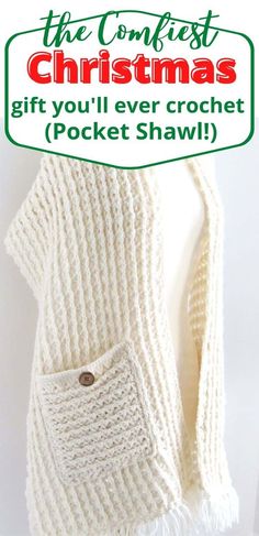 a white knitted sweater with the words, the contest christmas gift you'll ever crochet pocket shawl