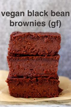 two pieces of chocolate brownies stacked on top of each other