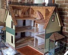 a doll house sitting on top of a table