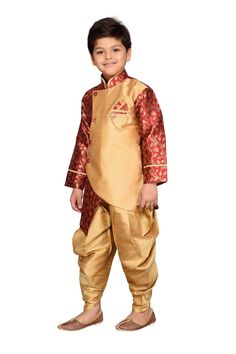 Traditional is never out of fashion, so how about decking up your little boy in something ethnic and truly Indian. AJ Dezines presents this party wear designer exclusive Sherwani Suit set for kids which includes a sherwani and a pair of dhoti style pyjamas with brooch.Made from silk blend fabric and gives an elegant look symbolising the traditional outfit of India. Featuring nehru collar, side button detailing, printed pattern, full sleeve, welt pocket, pocket square, brooch detailing. This dres Boys Diwali Outfit, Art Silk Sherwani For Diwali Puja, Art Silk Sherwani For Puja During Diwali, Diwali Art Silk Sherwani For Puja, Traditional Sherwani For Diwali Celebration, Art Silk Sherwani For Eid Puja, Traditional Sherwani For Eid Celebration, Boys Traditional Wear Indian, Gold Sherwani For Puja On Eid