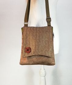 "This designed Canvas small bag is a great bag for daily use. It consists of a variety of fabric which makes it unique and beautiful. The bag is closed by a zipper and  Another  back pocket closed with a zipper, great safe storage of objects / Mobile Phone . The straps are soft and can be adjusted. on the bag a designed button that adds nice chiq to the bag  A perfect small zipper purse cross body bag for people who are minimalist.  --------------------------------------------------------------- Handmade Brown Phone Bag For Daily Use, Handmade Brown Phone Bag For Everyday Use, Brown Crossbody Phone Bag, Brown Crossbody Phone Bag For Everyday, Brown Everyday Crossbody Phone Bag, Handmade Beige Phone Bag For Everyday, Brown Crossbody Phone Bag As Gift, Brown Crossbody Shoulder Bag For Gift, Brown Crossbody Shoulder Bag As Gift