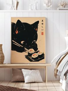 a black cat eating sushi with chopsticks on a table next to a bed