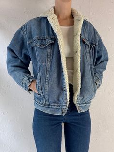 - Vintage 1980s Levis faux shearling lined denim jacket - Snaps up the front - Made in USA - Tagged L but fits womens XS Chest: 20.5" Length: 23" Sleeve: 19" Affordable Levi's Denim Blue Outerwear, Fleece Lined Denim Jacket Outfit, Cheap Levi's Long Sleeve Outerwear, Winter Denim Jacket With Faux Fur Lining, Fall Denim Jacket With Faux Fur Lining, Retro Denim Winter Outerwear, Retro Denim Blue Jacket For Winter, Retro Medium Wash Outerwear For Winter, Retro Medium Wash Winter Outerwear