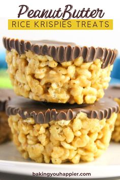 three peanut butter rice krispies are stacked on top of each other with chocolate in the middle