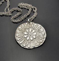 "Sterling silver pendant made after a piece of vintage lace I found at the antique shop. This pendant is about 7/8\" (23 mm) in diameter in bright silver finish and comes with a 16\" sterling silver chain. I can oxidize both, the pendant and a chain per request. I also have matching earrings, shown on the last picture. Made to order. This listing is for a pair very similar in look and dimensions to the earrings in the pictures. Production time from the date of your order is currently about two w Shape Circle, Round Necklace, Antique Shop, Disc Pendant, Oxidized Sterling Silver, Contemporary Jewelry, Antique Shops, Vintage Lace, Flower Shape