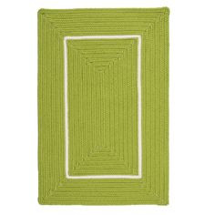 a green rug with white trim on the bottom and an empty square in the middle