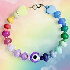 DREAM BRACELET THE DREAM rainbow style BRACELET will bring that colorful touch to your wrist for a 100% crazy summer. If your heart makes boom boom boom, this bracelet is made for you. Purple lucky eye pendant 5 Bracelet sizes Stainless steel glass bead Psst: Be careful, I'm fragile and a pretty fanciful person, I don't really like household products, take care of me and I will make you radiant on all occasions. Rainbow Rave Bracelets For Friendship, Trendy Multicolor Bracelets With Heart Charm, Trendy Multicolor Heart Bracelet With Colorful Beads, Trendy Multicolor Heart Charm Bracelet, Trendy Multicolor Beaded Heart Bracelet, Rainbow Rave Bracelets As Gift, Rainbow Rave Jewelry With Colorful Beads, Trendy Adjustable Multicolor Evil Eye Bracelet, Trendy Multicolor Evil Eye Bracelet For Friendship