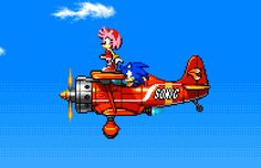 an old school video game with sonic and tails flying in the sky on top of a plane