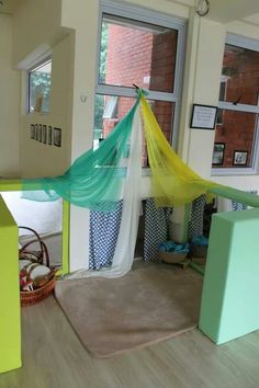 a room that has some kind of mosquito net in it