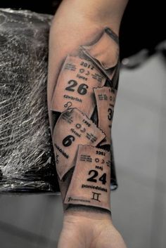 a man's arm with numbers on it and the number twenty seven in them