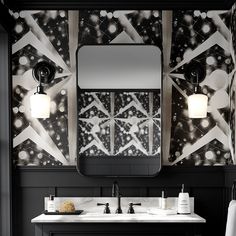 a bathroom with black and white wallpaper, marble counter top and double sink vanity