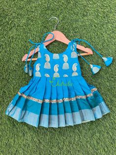 New born baby girls soft silk dress. READY TO DISPATCH Age: 0-3 Months Newborn baby girls blue Jumka design knot frock for cradle ceremony. The dress is made of soft Banarasi brocade and pure silk fabric. And it is fully lined with soft cotton and the stitches are concealed. So your little princess feels comfortable in this frock. BUYER'S PLEASE LEAVE YOUR CONTACT NUMBER. It's necessary for shipping. Please Visit Our Shop For More Unique Collection https://www.etsy.com/shop/Chitralie Light Blue Summer Festive Dress, Girl Frock Design, Cradle Ceremony, Banarasi Brocade, Newborn Baby Girls, Baby Frocks Designs, Frock Design, Blue Silk