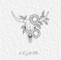 a cow skull with sunflowers on it's head and the words, to try