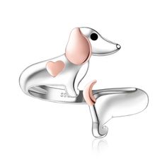 a white and pink dog ring with hearts on it's back, in the shape of a heart