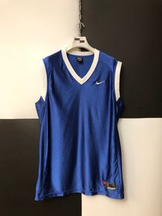 Size: XL Vintage Nike shooting Jersey with the classic shiny material. Great for the summer season ahead! Use it for sport, use it for fashi Team Spirit Tank Top For Summer Sports, Team Spirit Tank Top For Sports In Summer, Summer Sports Tops With Team Spirit Style, Team-colored Sleeveless Sports Top, Collegiate Sports Tank Top, Summer Team Spirit Sleeveless Tank Top, Summer Sleeveless Team Spirit Tank Top, Sportswear Tops With Team Logo For Basketball, Sporty Basketball Team Tops