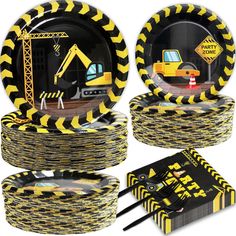 construction themed party supplies including plates and napkins