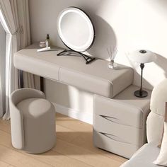 a white dressing table with mirror and stool