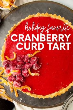 a pie with cranberry curd tart on it and the words holiday dessert