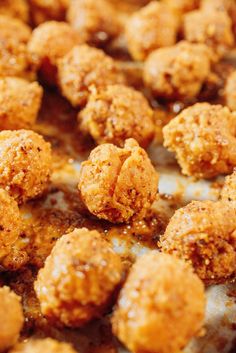 some food that is sitting on top of a pan and ready to be cooked in the oven