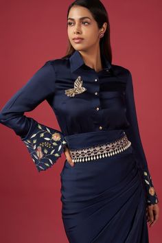 Blue shirt with sequin bead embellished bird motifs and placed floral motifs. Comes with pleated pencil skirt. - Aza Fashions Fitted Embellished Blouse For Work, Embellished Fitted Blouse For Work, Luxury Traditional Embellished Skirt, Designer Embellished Fitted Blouse, Designer Fitted Embellished Blouse, Elegant Fitted Embroidered Skirt, Fitted Silk Blouse Hand Embellished, Party Long Skirt Sets With Cutdana Detail, Festive Skirt With Cutdana Detailing