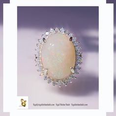 "★★Opal is one of the most favored gemstones among women. It is about the play of color in that natural Opal gemstone, that attracts the eyes,  you simply cannot take your eye off it. My love for unique gemstones brings me to look for unusual, one-of-a-kind gemstones, like the one set in this ring. ★★This 14k solid gold ring is set with a -  genuine - natural - huge - Ravishing - One of kind-rainbow fire Opal. The kind of Opal that your eyes just can't get enough of. ★★This fire Opal weighs 10.3 White Ethiopian Opal Ring For Formal Occasions, Formal White Ethiopian Opal Ring, White Ethiopian Opal Ring For Anniversary, White Ethiopian Opal Ring Fine Jewelry, Anniversary Pink Opal Gemstone Ring, Anniversary Pink Opal Ring, White Opal Halo Ring, White Ethiopian Opal Ring For Promise, White Ethiopian Opal Promise Ring