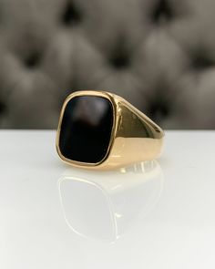 Men Ring with Onyx, Black Pinky Signet Ring, Square Shape Genuine Gemstone, Stylish Gold / Silver Ring, Handmade Jewelry, Best Gift for Him ◎ Details ◎ ○ Material 14K Solid Gold or 925 Sterling Silver Weight of Ring : approx 18.00 gr Height of Ring : approx 5.30 mm ○ Upgrade to Solid 18K Gold, please click the link below: https://www.etsy.com/listing/962826004 ○ Gemstone Natural Onyx Gemstone approx. 15 mm x 15 mm 4.23 ct Made to Order HANDMADE ITEM ○ For Men Collection : https://etsy.me/2PmKJMW Formal Black Dome Ring With Polished Finish, Luxury Hallmarked Onyx Rings, Formal Onyx Rings With Polished Finish, Luxury Onyx Round Signet Ring, Elegant Onyx Signet Ring As Gift, Gold Onyx Rings With Polished Finish, Black Dome Ring With Polished Finish As Gift, Black Hallmarked Rings Fine Jewelry, Modern Onyx Signet Ring For Gift