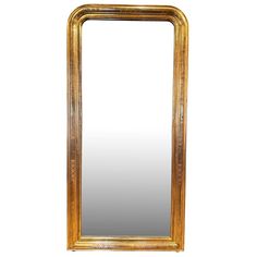 an antique gold framed mirror on a white background