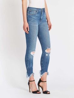 The ali jean in castleton from frame denim are a cigarette fit style in a soft blue wash. feature subtle fading whiskering throughout knee rip detail and distressed hems these jeans have shiny gold hardware and a high rise of 11 inches.    ----fabric or composition    the frame denim ali high rise skinny cigarette stiletto jean in castleton is made from 93% cotton 5% polyester 2% elastane    size and fit    the ali high rise skinny cigarette stiletto jean in castleton fits true to size    measur Mid-rise Denim Pants With Frayed Hem, High-waisted Blue Jeans With Frayed Hem, High-rise Fitted Rigid Denim Pants, Mid-rise Rigid Denim Pants With Frayed Hem, Rigid Denim Jeans With Contrast Stitching, Standard Cut, Denim Branding, Miranda Kerr, Light Denim, Frame Denim