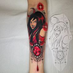 a woman's leg with a tattoo on it that has blood dripping down the side